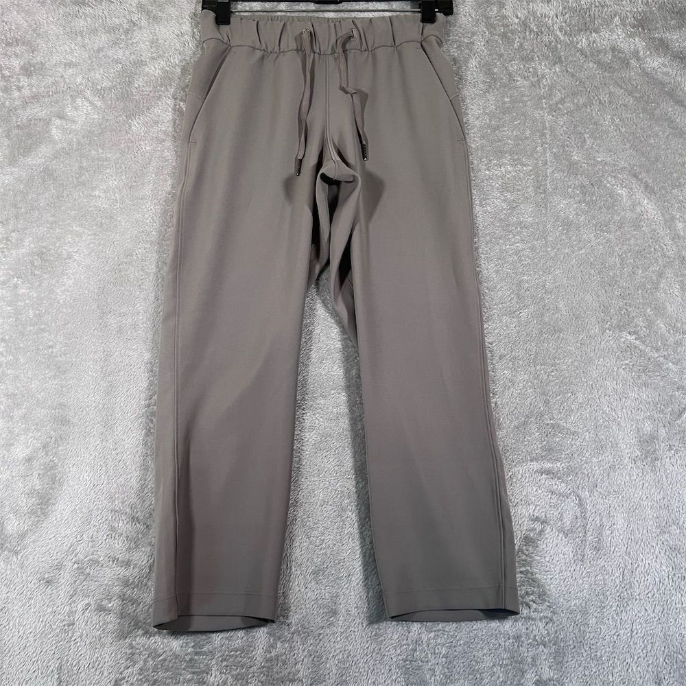Lululemon Women's On The‎ Fly Crop Pants Woven 23" Size 2 Gray Drawstring Waist